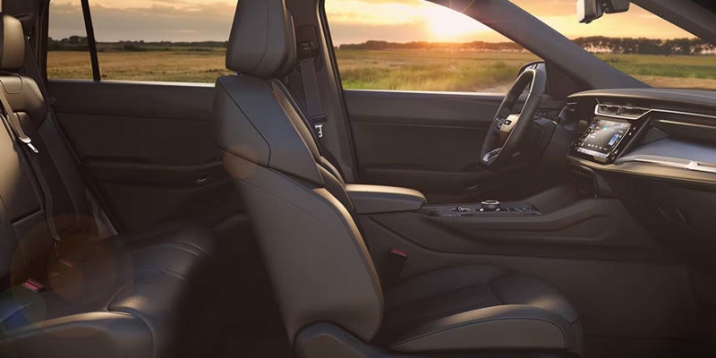 Premium Jeep interior with black leather front seats and dashboard