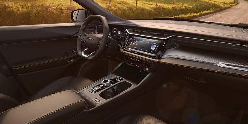 Modern Jeep dashboard with touchscreen infotainment system and center console