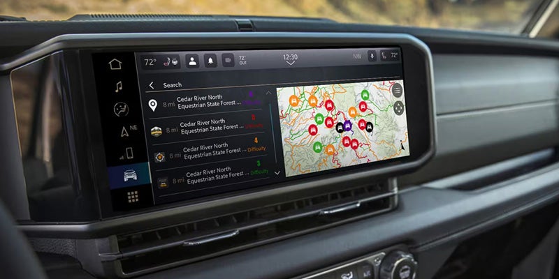 Jeep infotainment touchscreen displaying navigation and vehicle controls