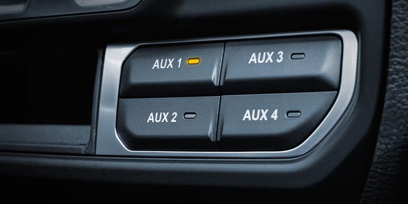 Close-up of Jeep auxiliary switch control panel on the dashboard